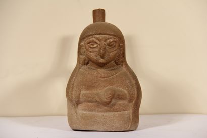 Stirrup vase representing a character wearing...