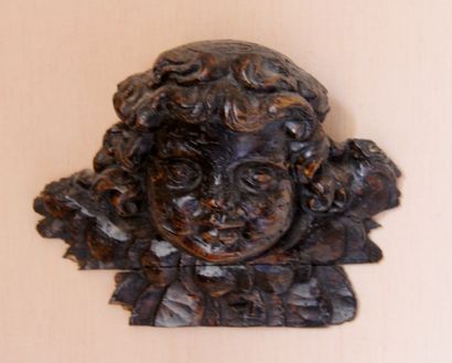 Tête d'angelot en bois naturel

18 x 22 cm....