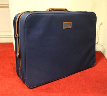 LANCEL

Valise en tissus bleu, poignet en...