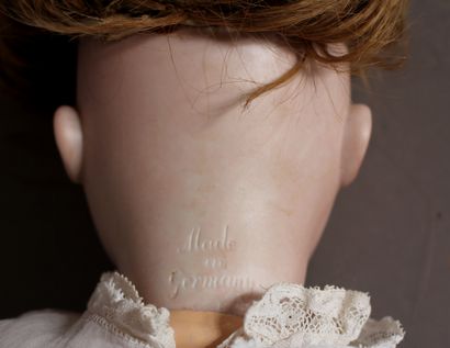 Poupée tête porcelaine bouche ouverte, yeux...