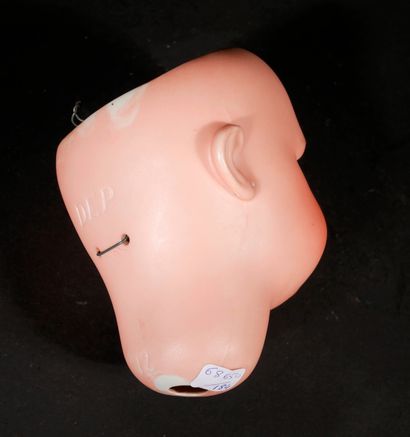 *DEP

Tête de poupée en porcelaine, yeux...