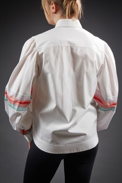 ALAÏA

Blouse en coton blanc, petit col,...