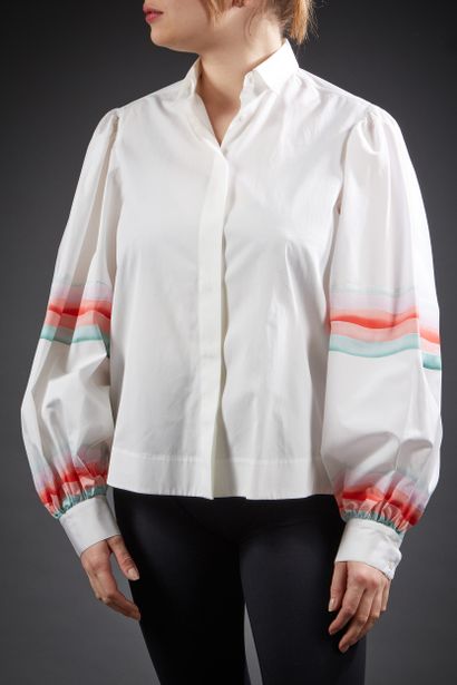 ALAÏA

Blouse en coton blanc, petit col,...