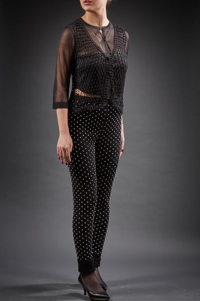 ALAÏA

Ensemble composé d'un cardigan court...