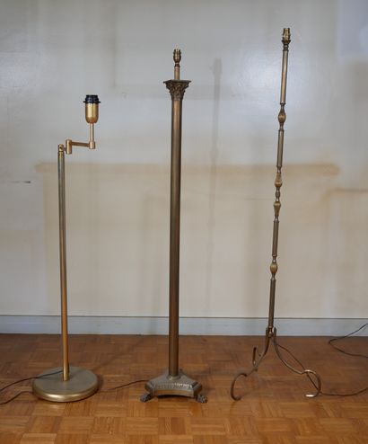 Two floor lamps and a modern articulated...