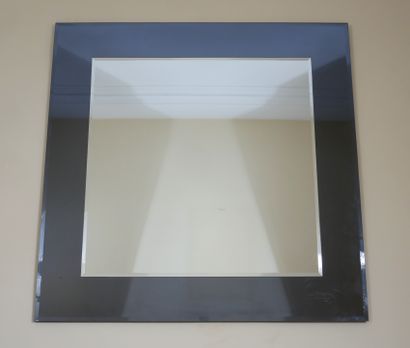 Rectangular bevelled glass on a mauve tinted...