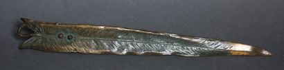 Bronze paper cup in the shape of a leaf and...