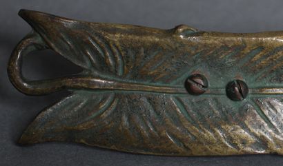 Bronze paper cup in the shape of a leaf and...