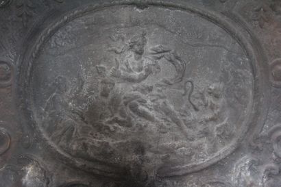 Cast iron fireback decorated with characters...