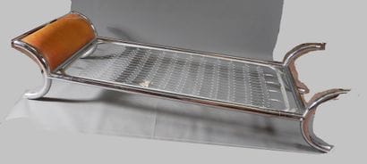 *Bed with tubular chromed metal uprights...
