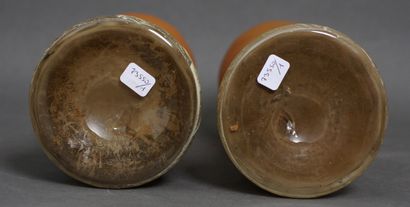 *A pair of orange glass baluster vases with...