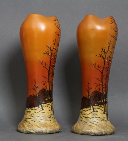 *A pair of orange glass baluster vases with...