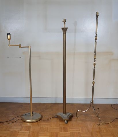 Two floor lamps and a modern articulated...