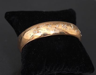 Bracelet rigide articulé en or jaune 18k...