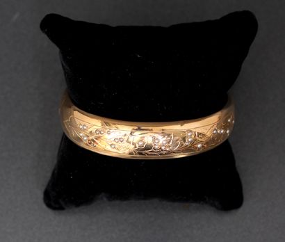 Bracelet rigide articulé en or jaune 18k...