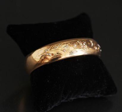 Bracelet rigide articulé en or jaune 18k...