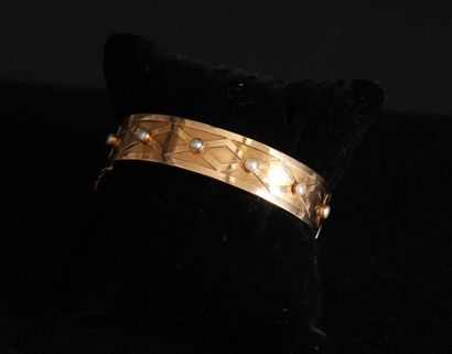 Bracelet rigide articulé en or jaune 18k...