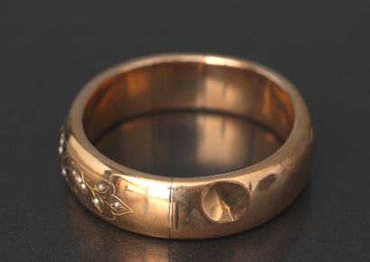 Bracelet rigide articulé en or jaune 18k...