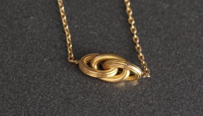 Chaine de cou ornée d'un nœud en or jaune...