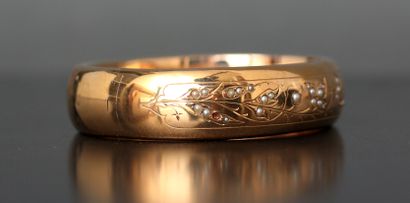Bracelet rigide articulé en or jaune 18k...