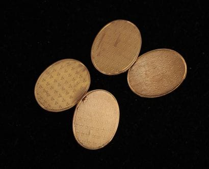 Paire de boutons de manchette ovale en or...