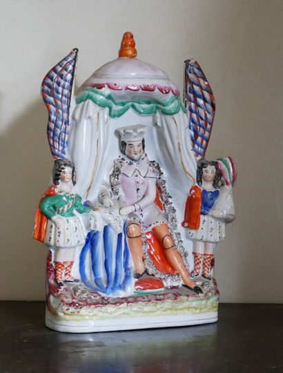STAFFORDSHIRE
Groupe en faïence polychrome...
