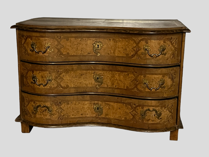 Commode galbée en bois de placage et bois...