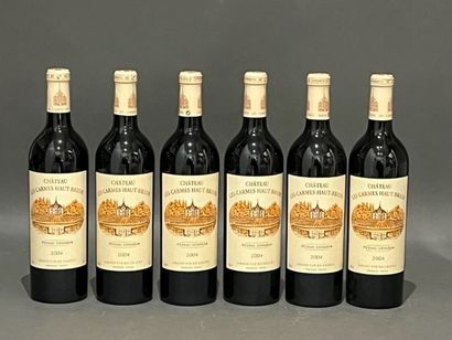 Six bottles Château LES CARMES HAUT BRION,...