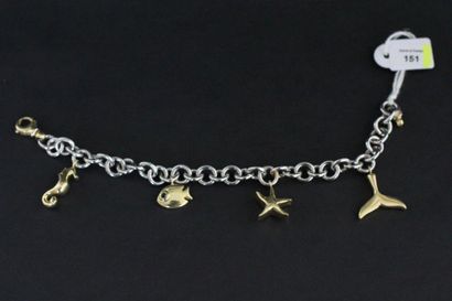Bracelet articulé en or gris supportant quatre...