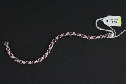 Bracelet articulé en or gris serti d'une...