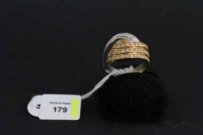 Bague en or jaune et gris ornée de six lignes...