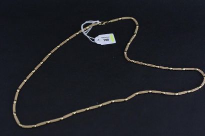 Collier articulé en or jaune, les maillons...