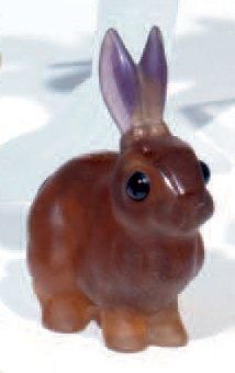 DAUM
«Lapin». Epreuve en pâte de verre orangé...