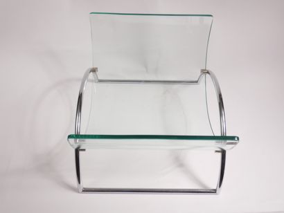Porte bûche en verre et métal chromé.


Travail...
