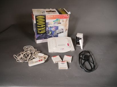 *AMSTRAD
GX4000 game console, two joysticks...
