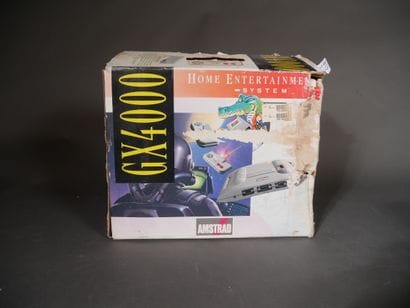 *AMSTRAD
GX4000 game console, two joysticks...