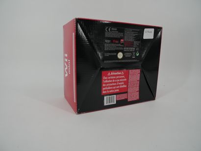 *NINTENDO. WII mini
Black and red games console
In...