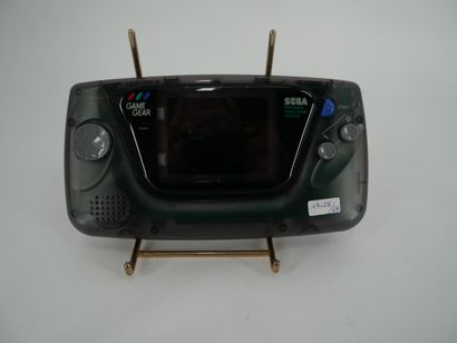 *SEGA. GAME GEAR
Black translucent portable...