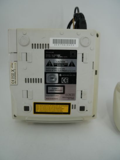 *SEGA. DREAMCAST
Two game consoles with two...