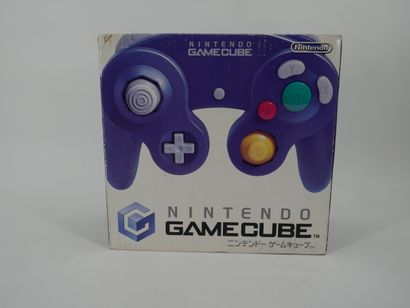*NINTENDO. GAME CUBE
Blue/purple game console
In...
