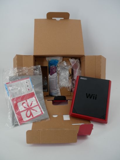 *NINTENDO. WII mini
Black and red games console
In...