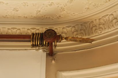 Wooden and bronze curtain rod and brackets,...