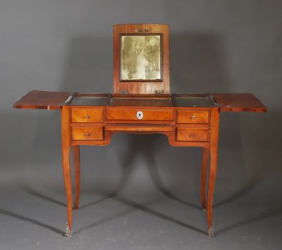 Veneered dressing table in mahogany frames,...