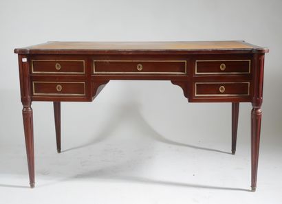 Flat mahogany desk opening with four drawers...