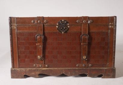 Small travel trunk in wood sheathed in imitation...