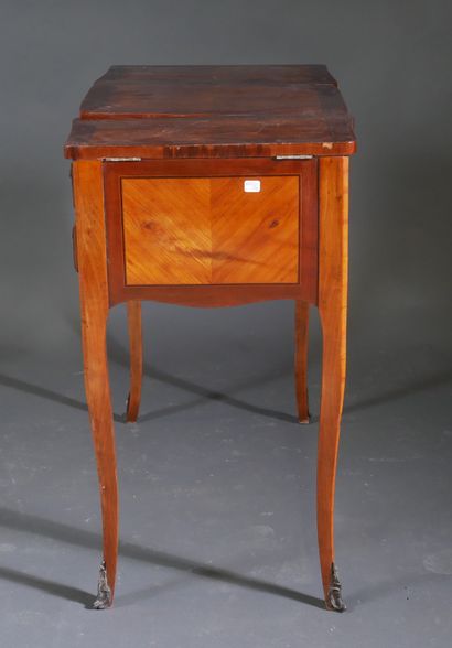Veneered dressing table in mahogany frames,...