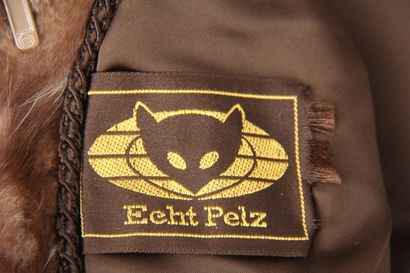 ECHT PELZ
Veste en fourrure marron tacheté...