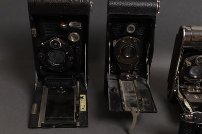 Set of seven gusseted cameras:
- KODAK vest...
