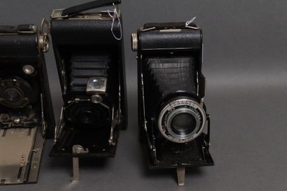 Set of seven gusseted cameras:
- KODAK vest...