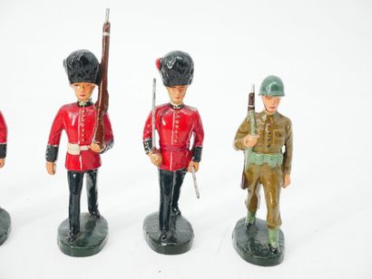 Set of 9 figures in painted composition,...